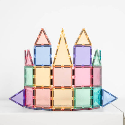 Colorful magnetic tile castle on a white background