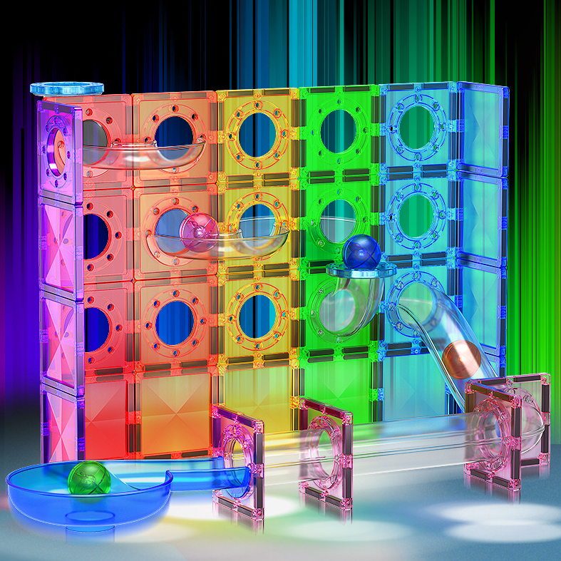 Colorful transparent Magnetic tile set with a ball on a dark background